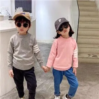 Uniseks trui in effen kleur